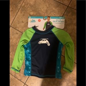 New w/tags boys long sleeve sun shirt.Sz M 2-4 yrs